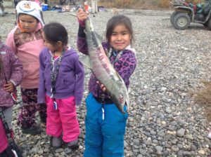 Child holding fish