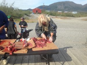 Terri cutting meat