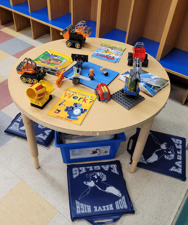 classroom table with supplies