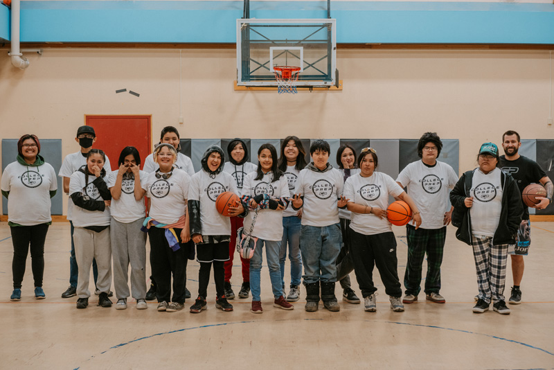Kids posing for photo at Basketball camp